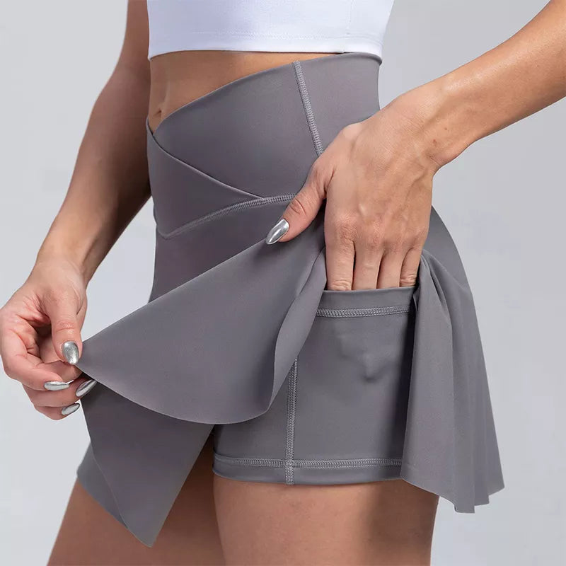 Saia de tênis plissada com bolsos