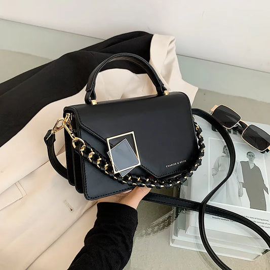 Bolsa de ombro luxuosa com corrente